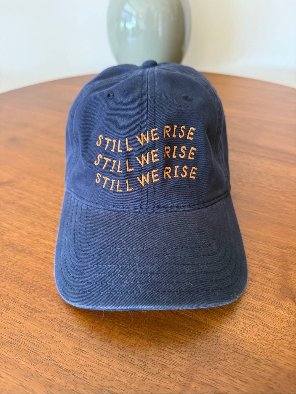 Navy Still We Rise baseball hat
